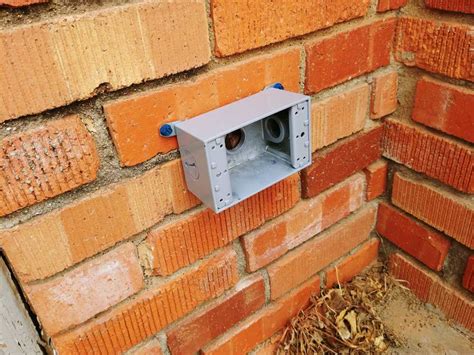 how to add an exterior electrical box to brick|how to add electrical boxes.